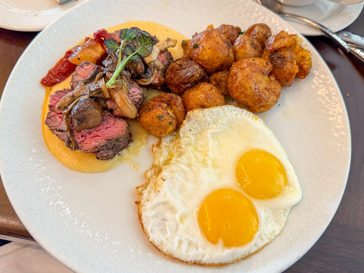 Wood-fired steak and eggs at Topolino's Terrace, Riviera Resort